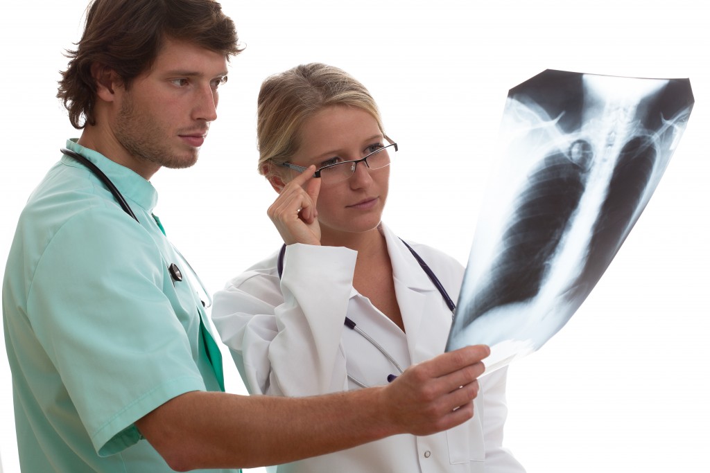 doctors looking at an xray