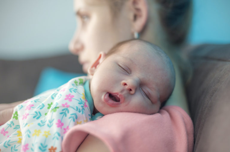 mother holding child