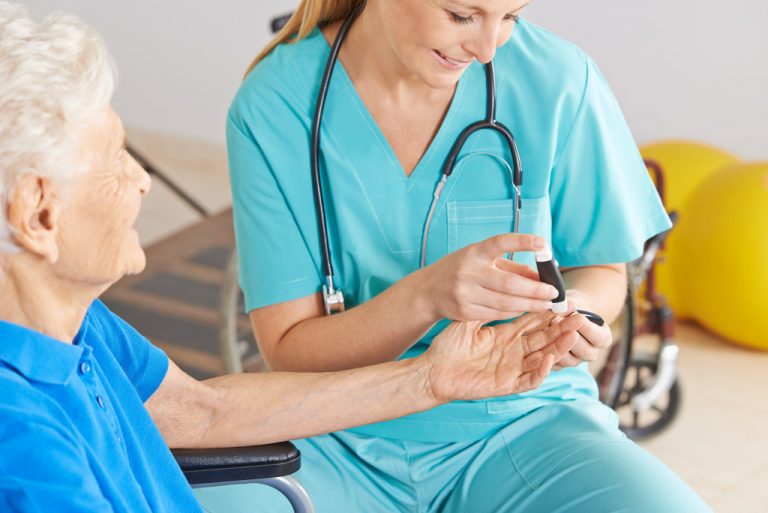 an elder woman and a nurse