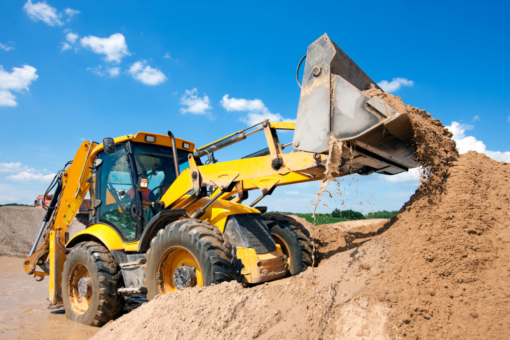 A backhoe being used for construction projects