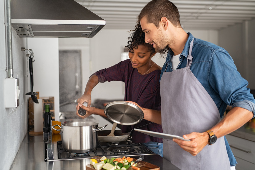 couple cooking in the kitchen