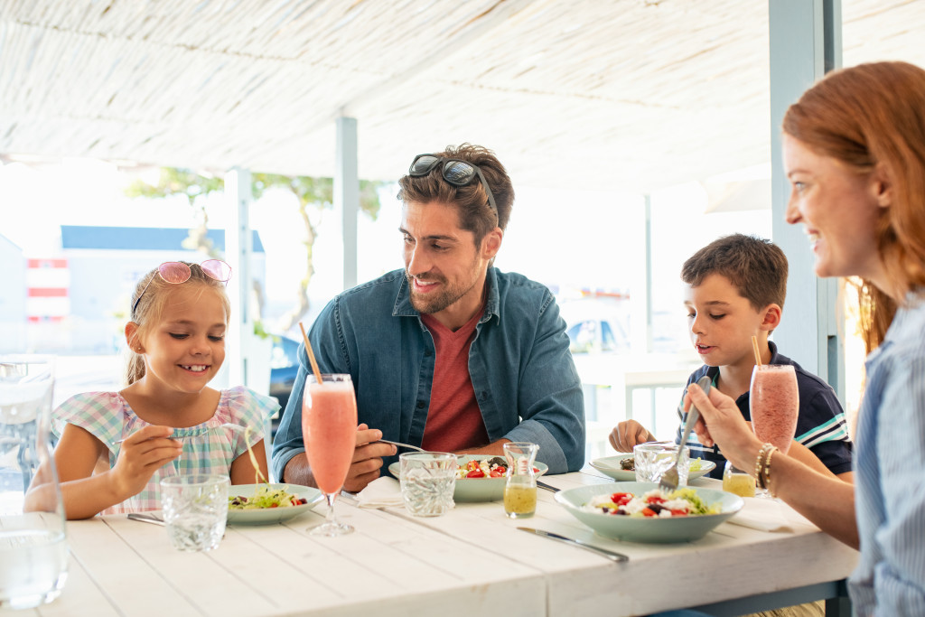 a family talking during meal time