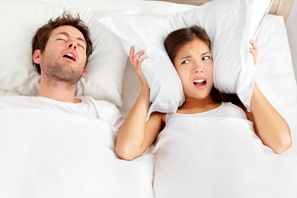 a woman disturbed because her partner has a sleeping disorder