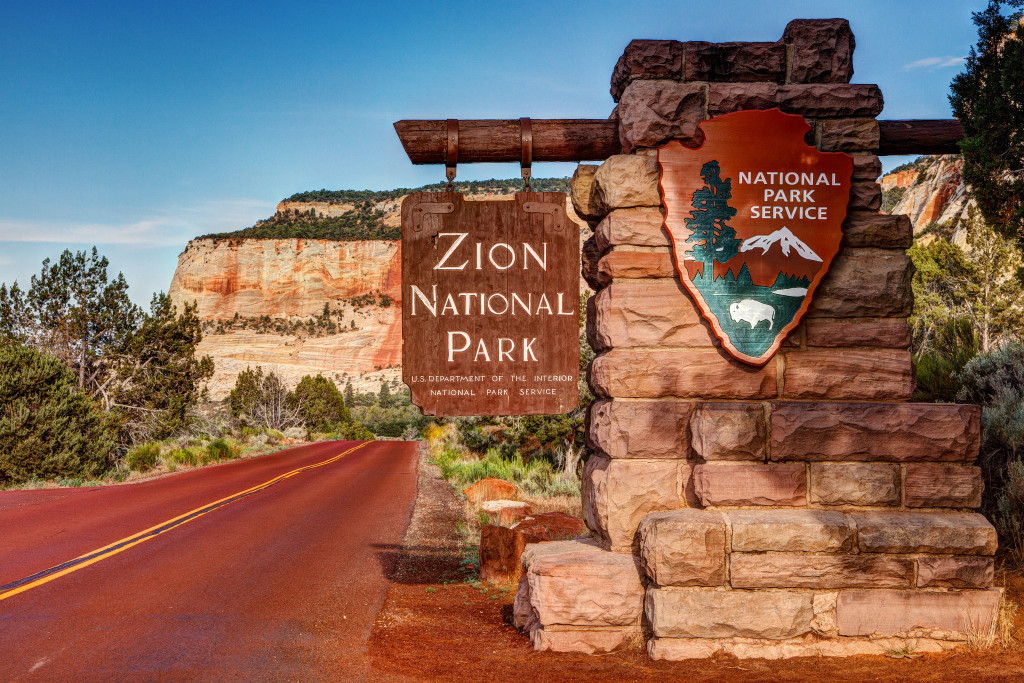 welcome sign at the entrance of Zion National Park