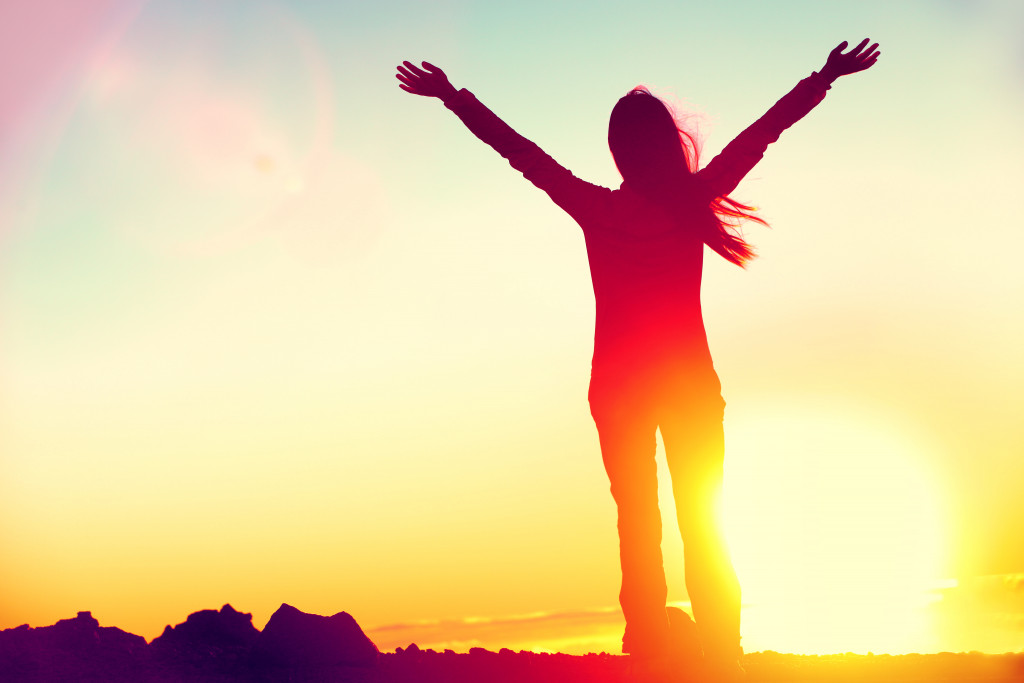 woman silhouette in red and orange hue