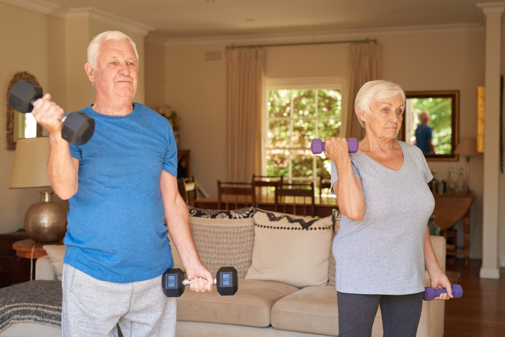 senior exercise couple at home